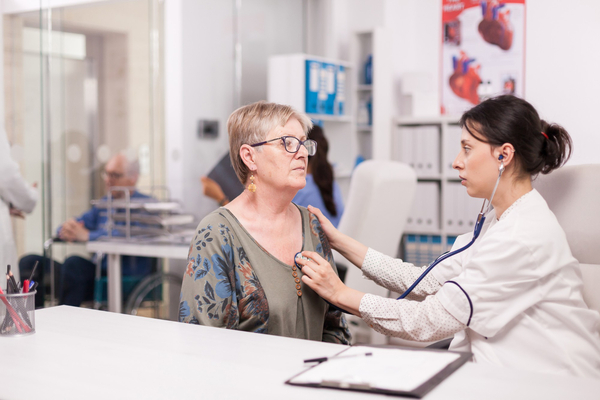 Why does heart disease risk increase for women after 55, and what tests should I do every year?